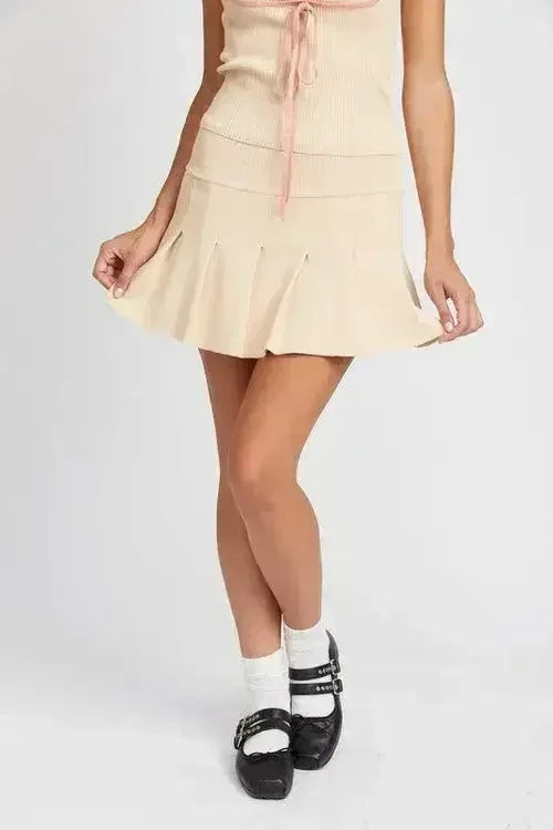 JUPE COURTE PLISSÉE TAILLE BASSE