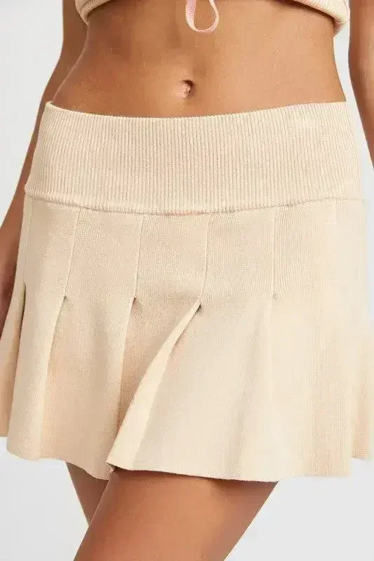 JUPE COURTE PLISSÉE TAILLE BASSE
