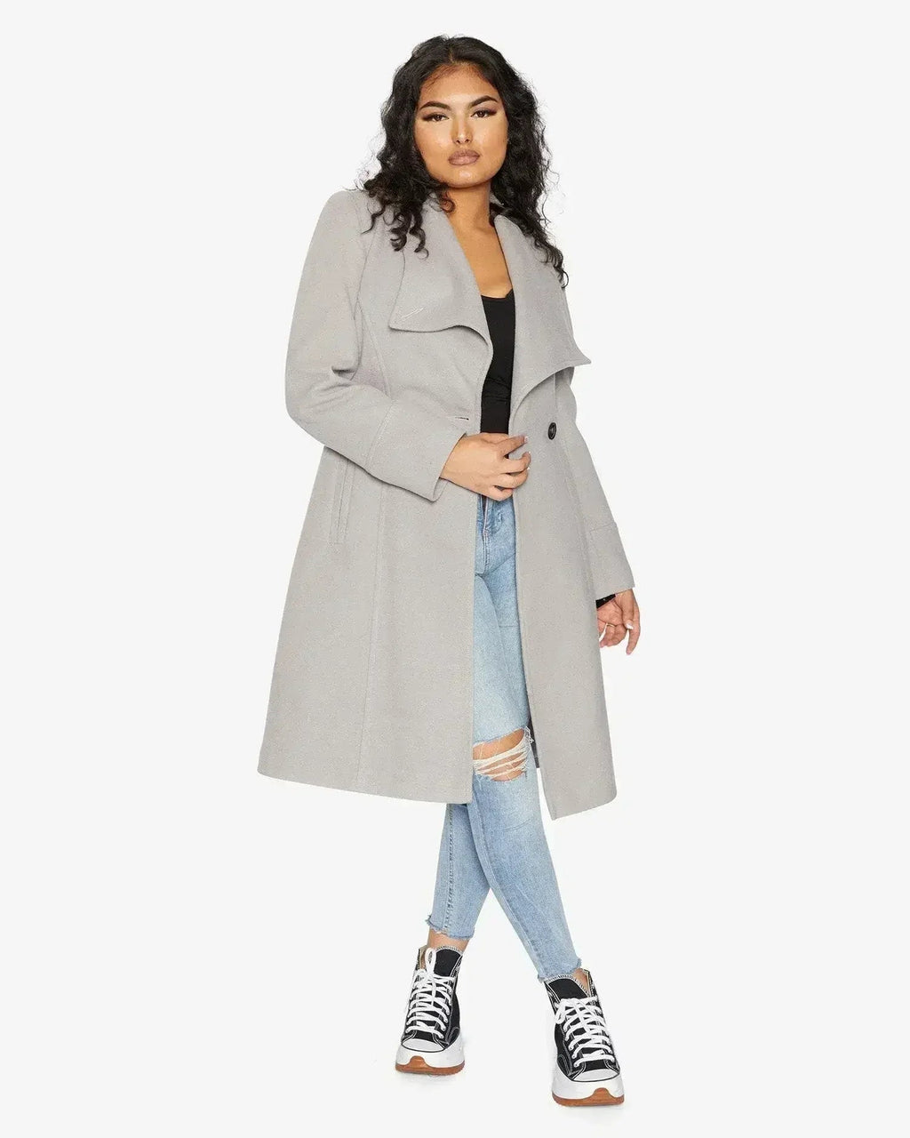 Manteau long à double boutonnage et revers cascade
