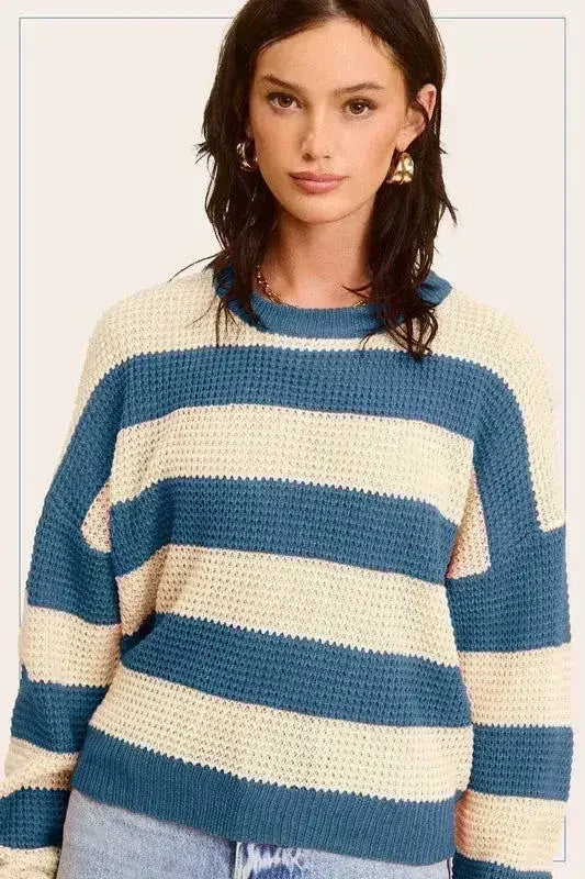 Pull rayé à col rond et coupe ample