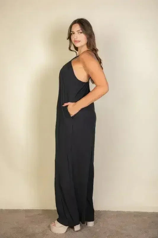 Combinaison pantalon large unie à fines bretelles grande taille