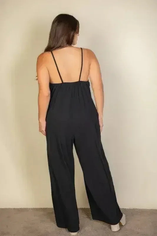 Combinaison pantalon large unie à fines bretelles grande taille