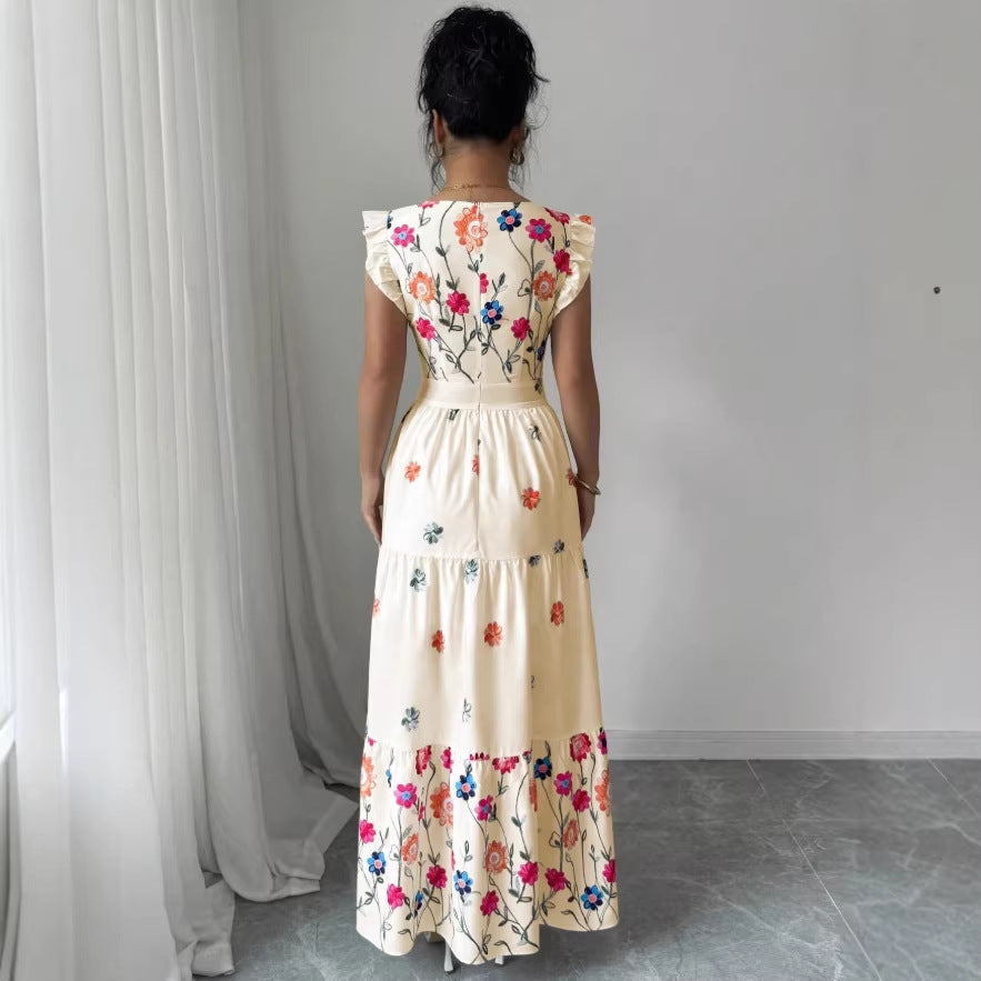Robe fleurie à manches bouffantes et taille cintrée pour femme
