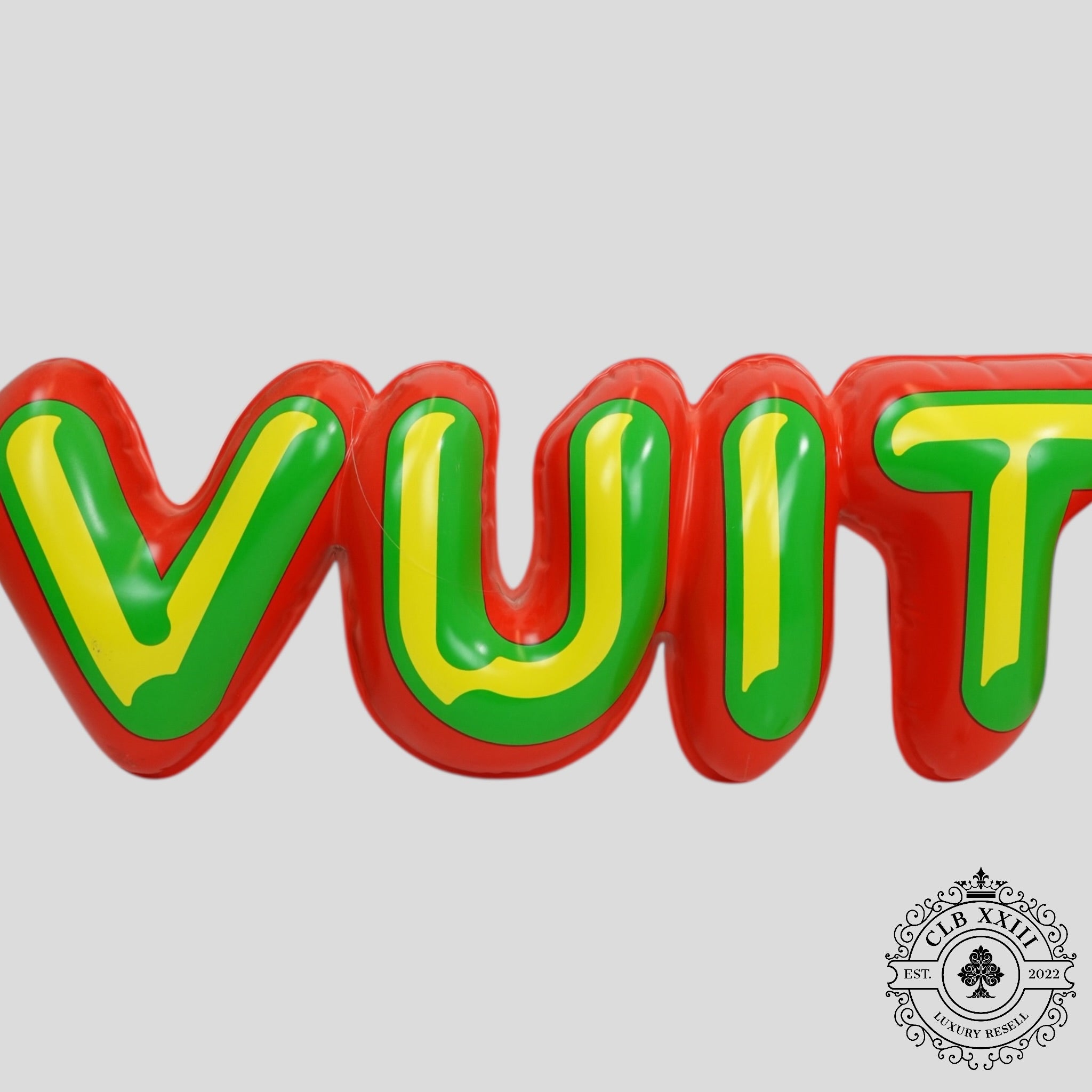 Enseigne de magasin Louis Vuitton lettres bulles