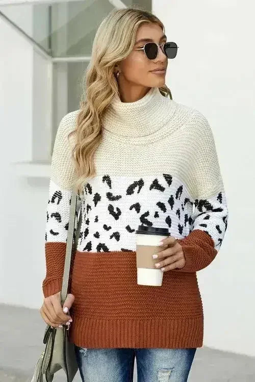 Pull en grosse maille à col roulé abricot hiver avec épissures