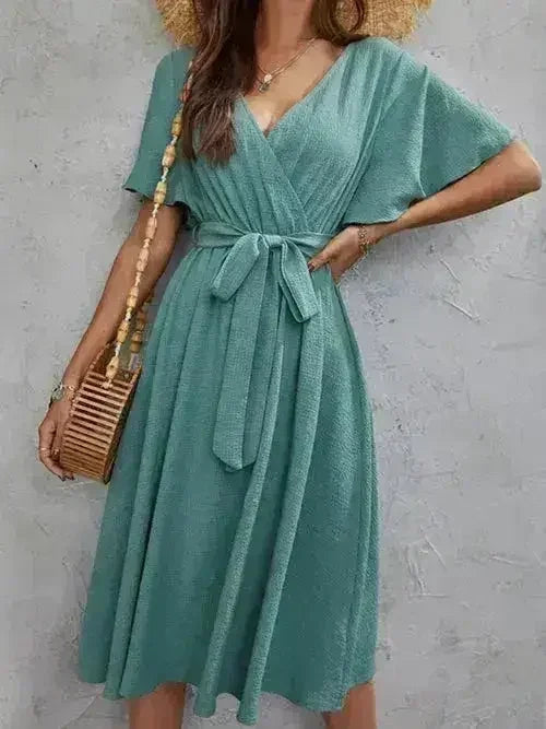 Robe midi à manches flottantes et nouées aux poignets – Femstylo