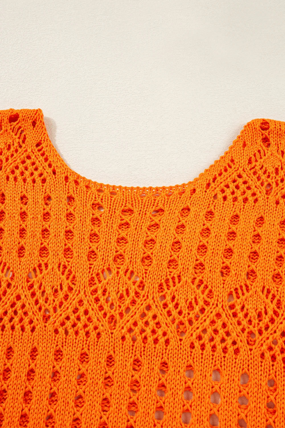 Pull au crochet uni couleur carotte avec bord festonné