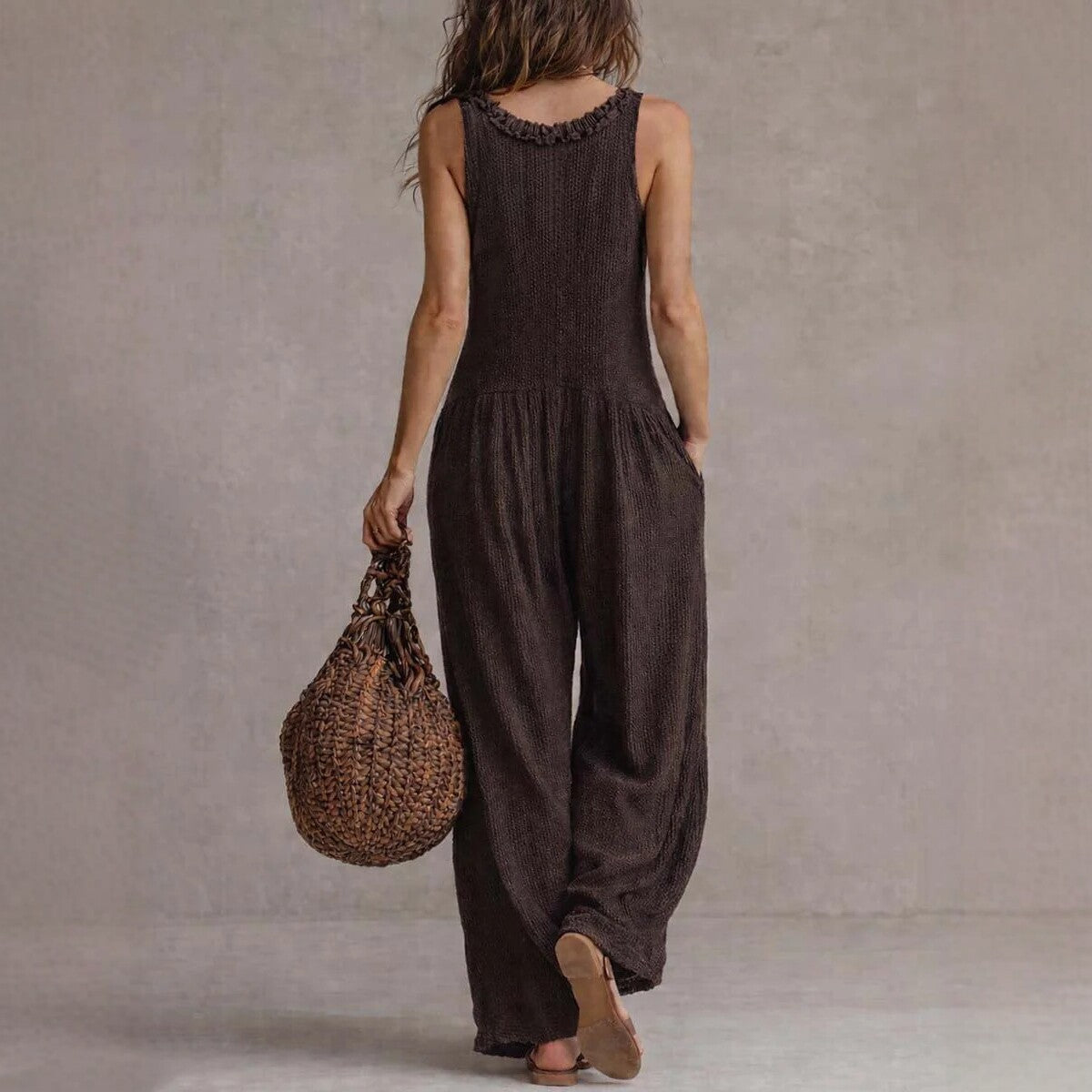 Combinaison ample sans manches à col en V et jambes larges pour femme