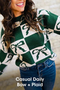 Pull en maille à carreaux vert noirâtre avec nœuds imprimés