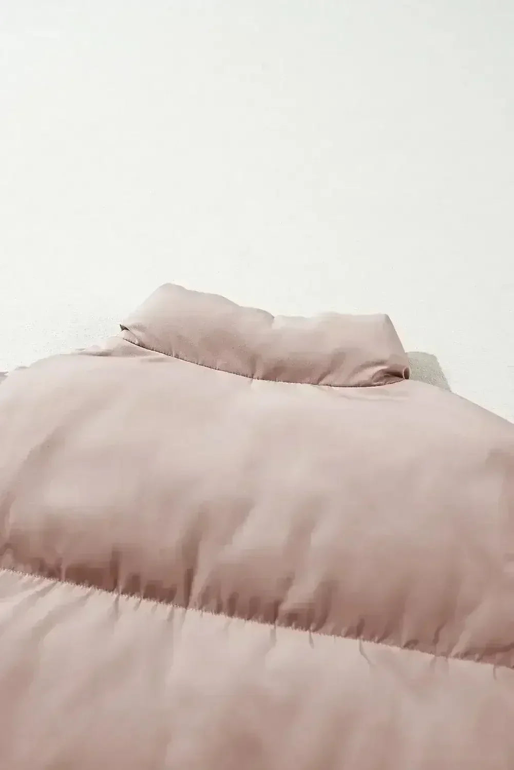 Doudoune matelassée zippée rose abricot