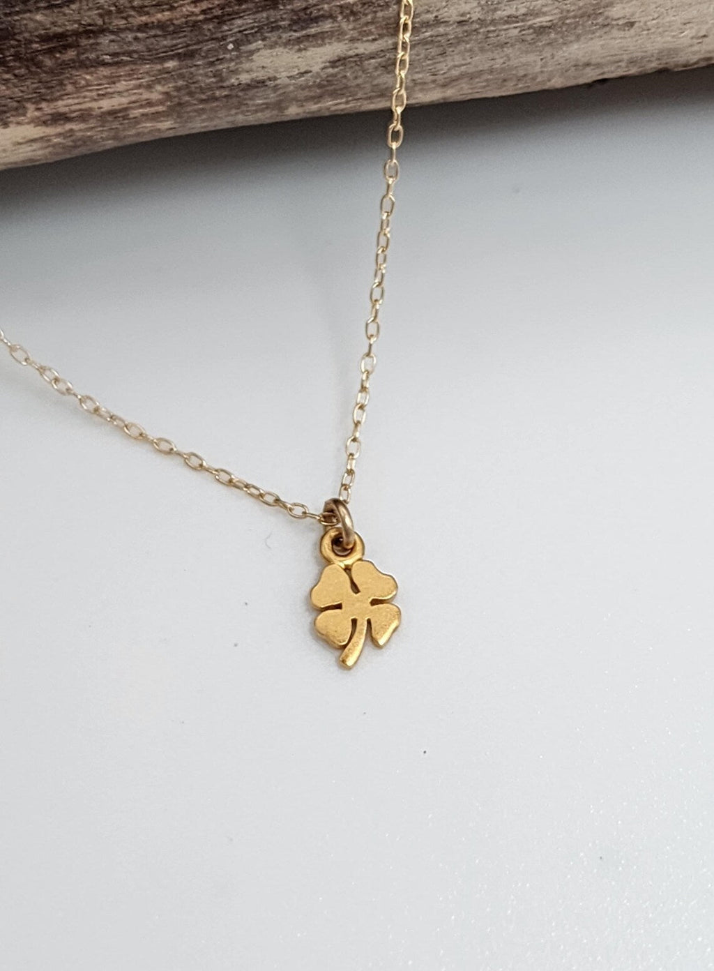 Tiny Gold Shamrock Necklace – Matte Vermeil Charm on 16" Chain
