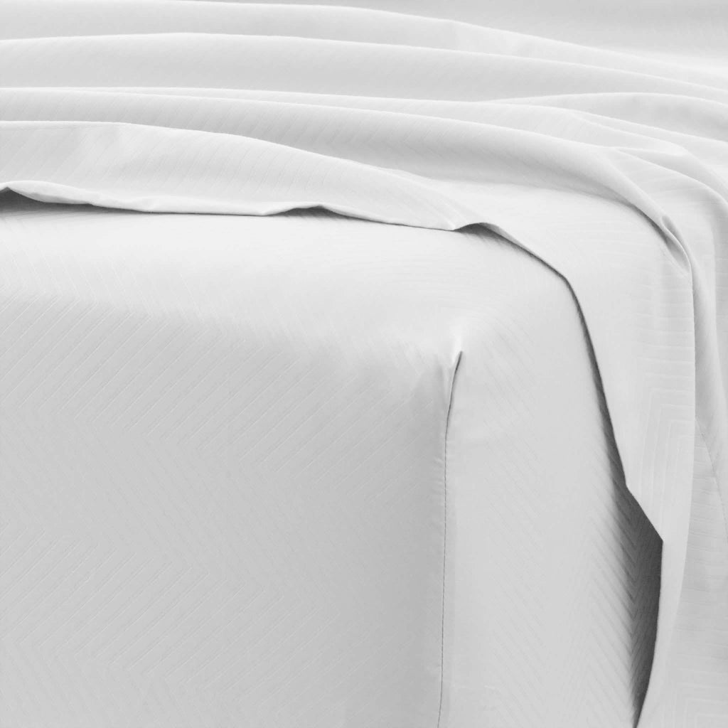 Ensemble de draps 4 pièces : motifs chevrons en relief