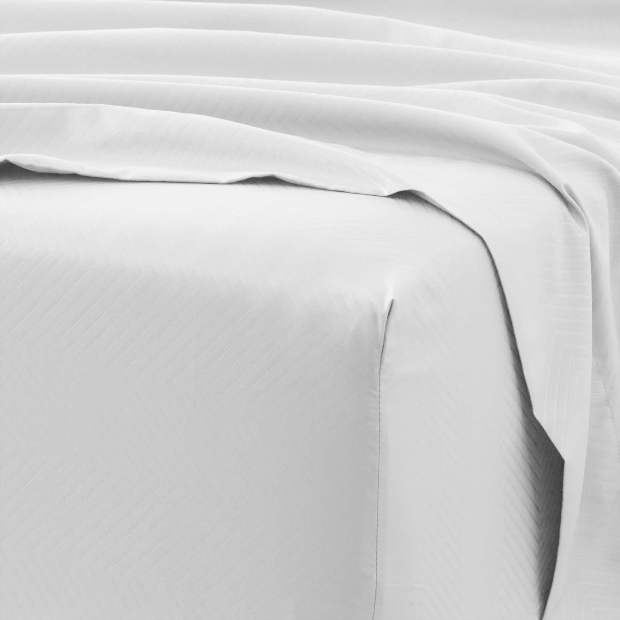Ensemble de draps 4 pièces : motifs chevrons en relief