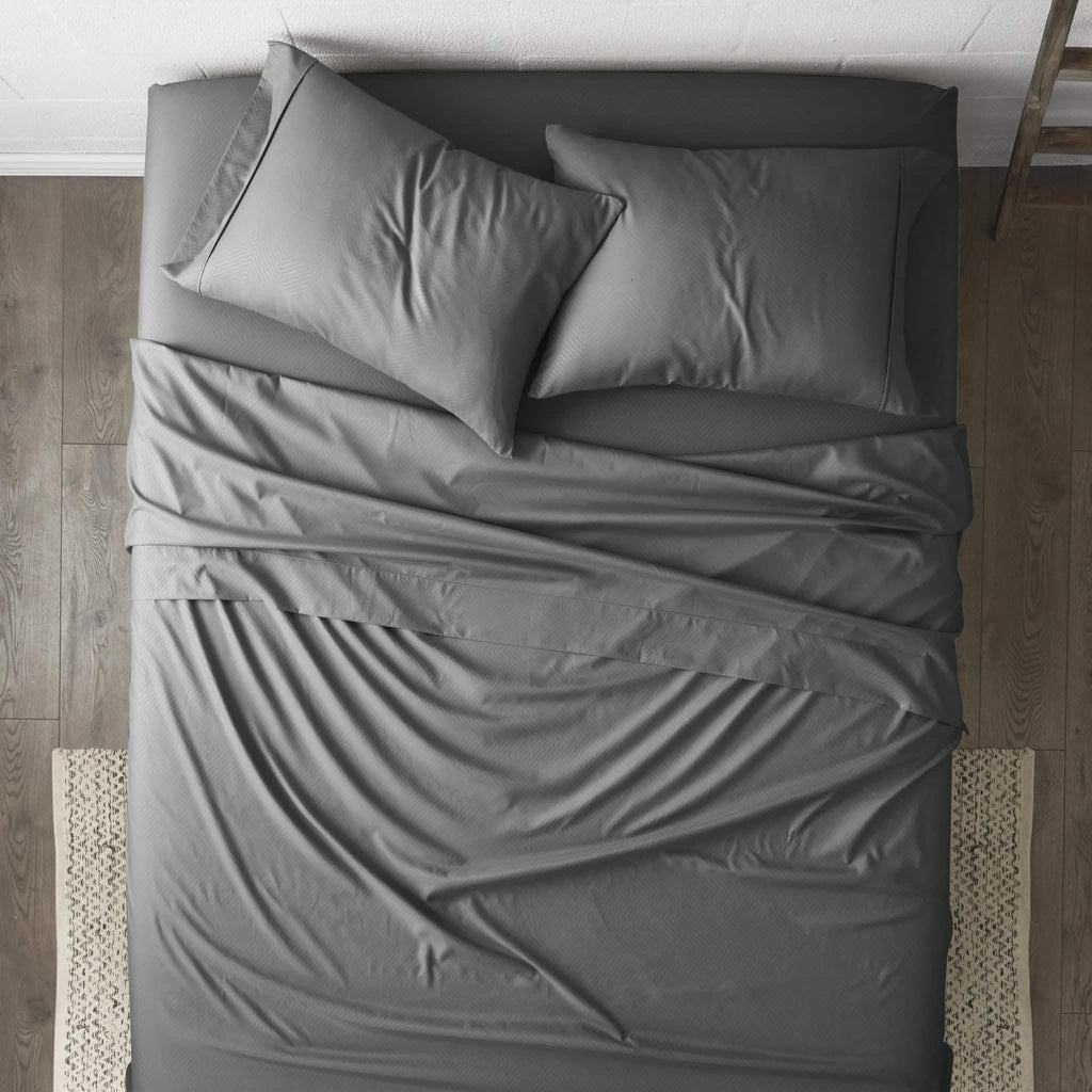 Ensemble de draps 4 pièces : motifs chevrons en relief