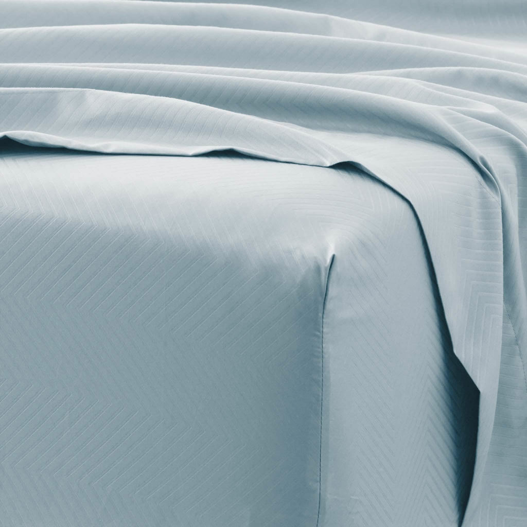 Ensemble de draps 4 pièces : motifs chevrons en relief
