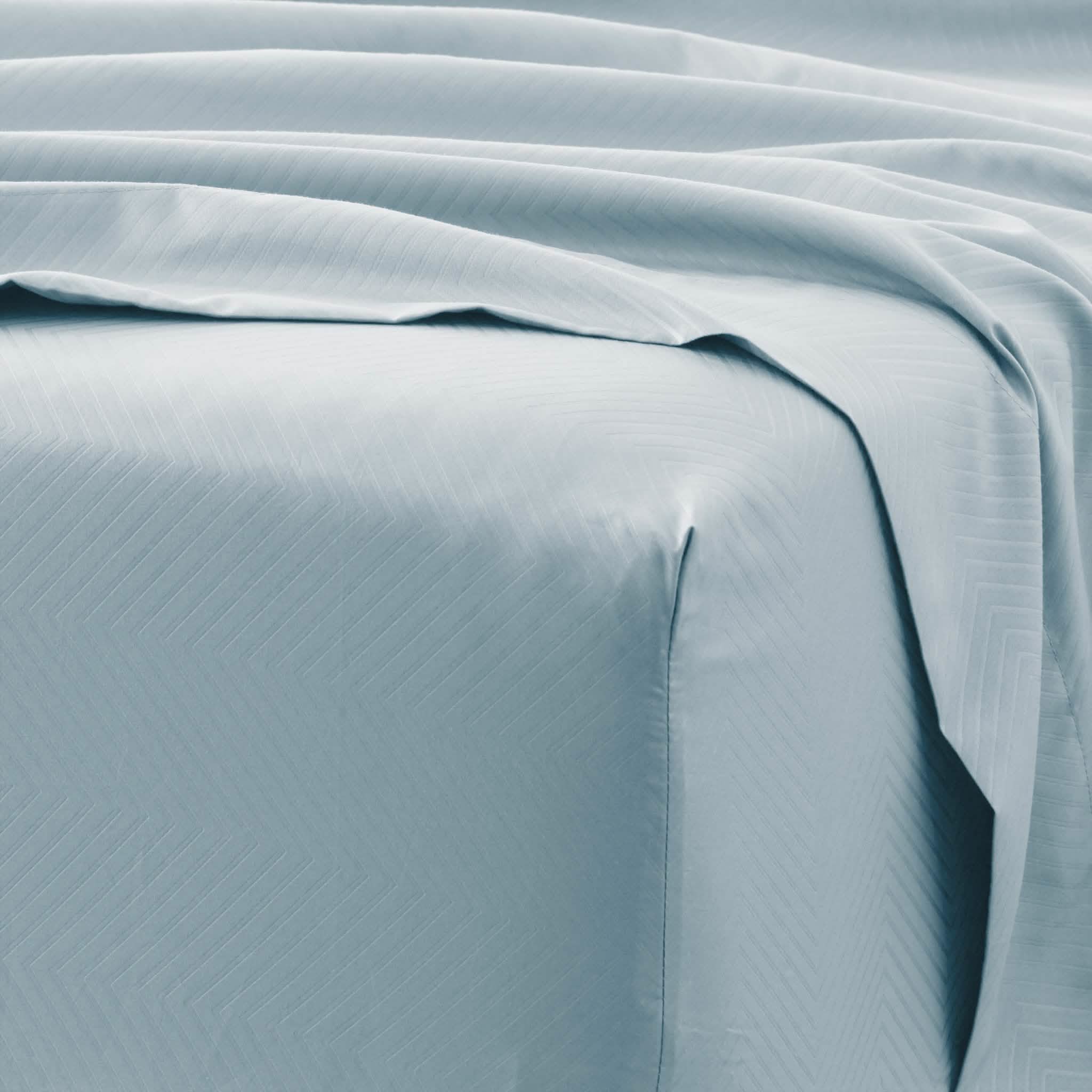 Ensemble de draps 4 pièces : motifs chevrons en relief
