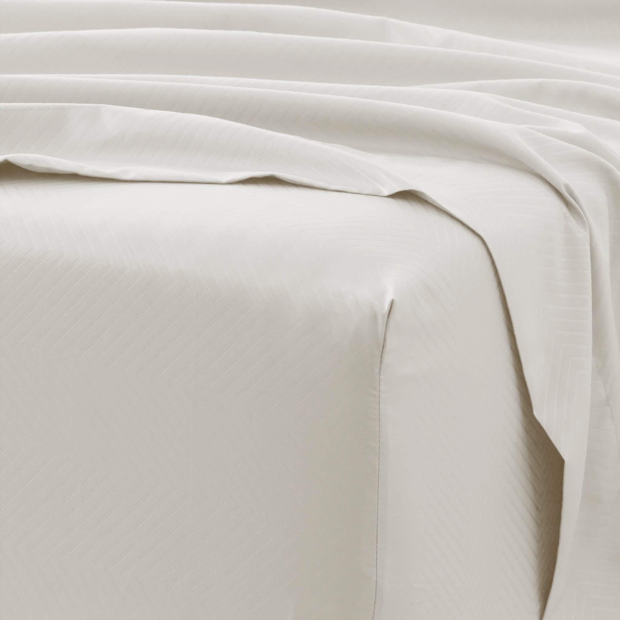 Ensemble de draps 4 pièces : motifs chevrons en relief