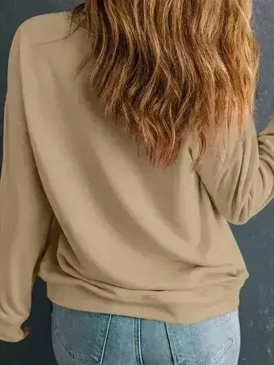 Sweat-shirt col rond motif trèfle brodé