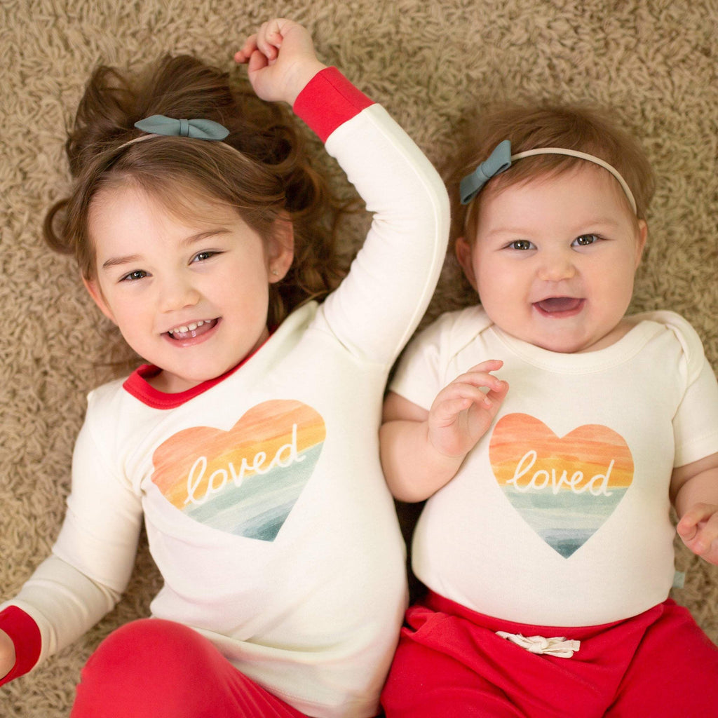 graphic bodysuit | loved rainbow heart