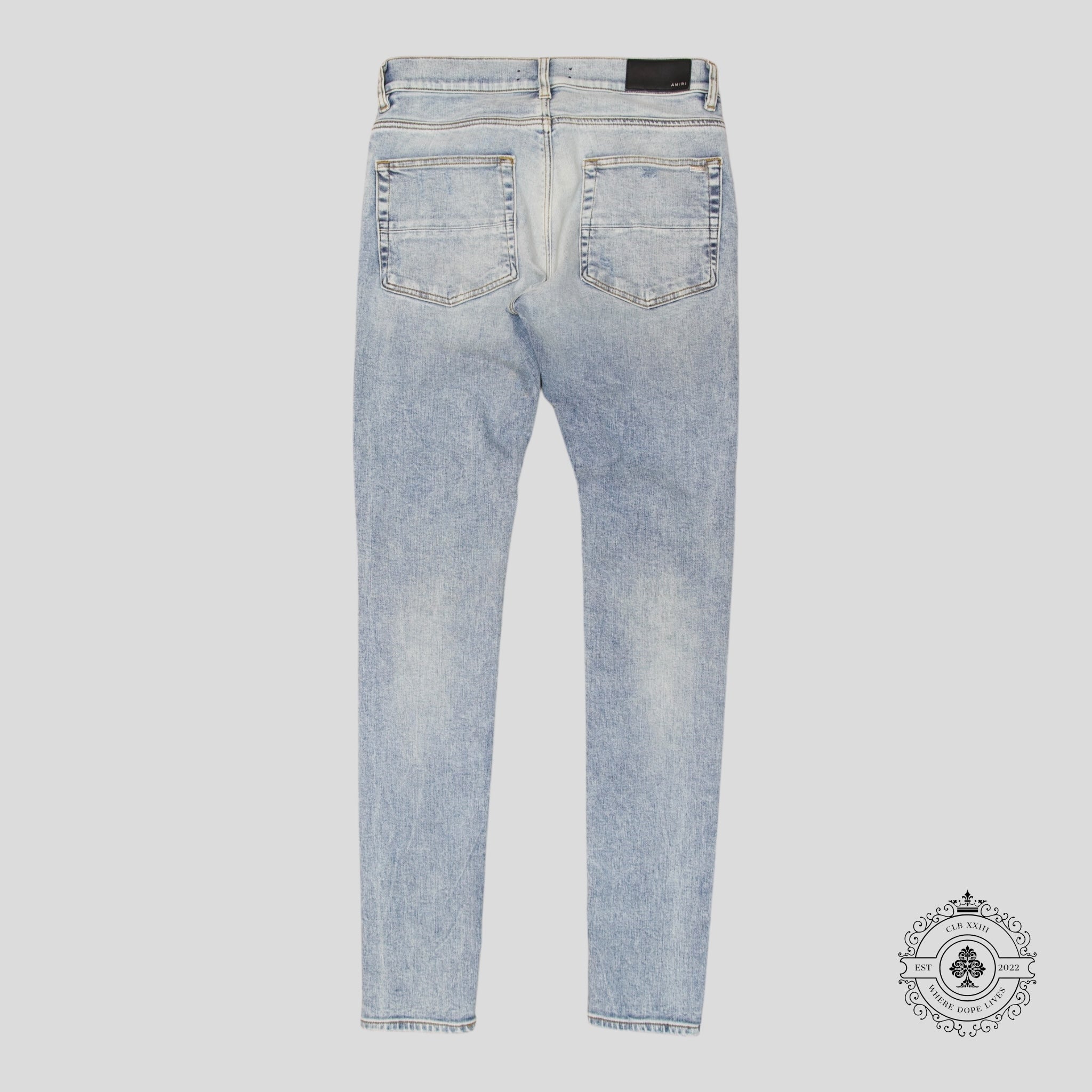 Jean Amiri MX1 en cuir et denim stone indigo