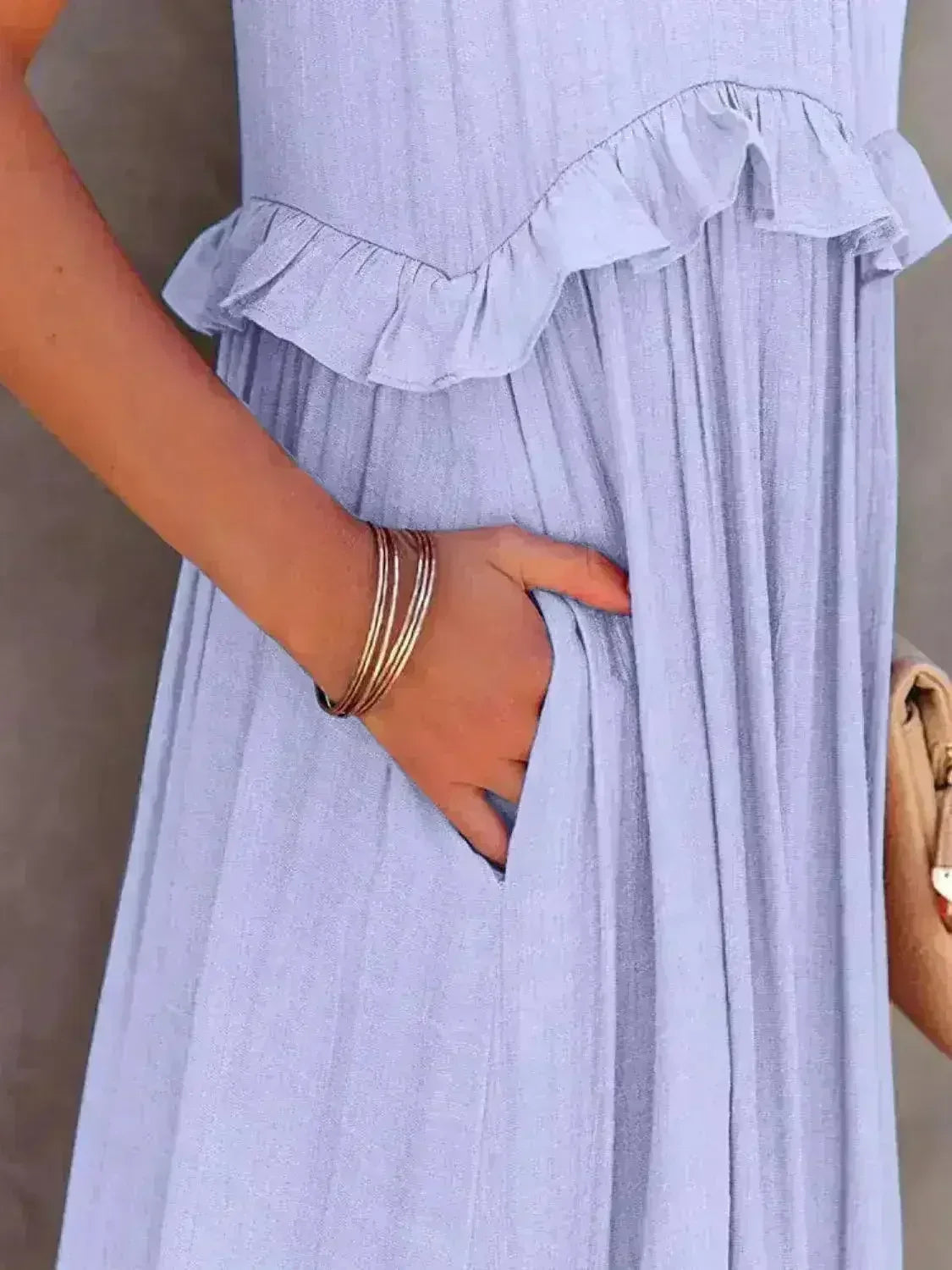 Robe longue étagée sans manches à volants avec poches