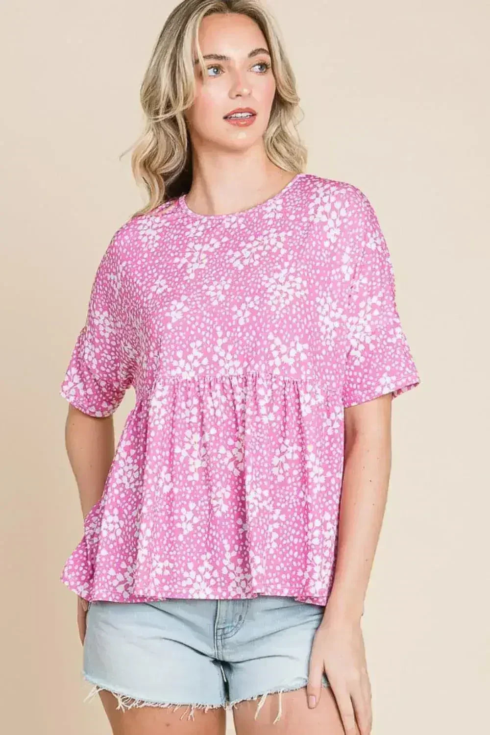 Chemisier péplum fleuri - Top col rond pour femme | Femstylo