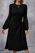 Robe midi noire à manches bouffantes et unies