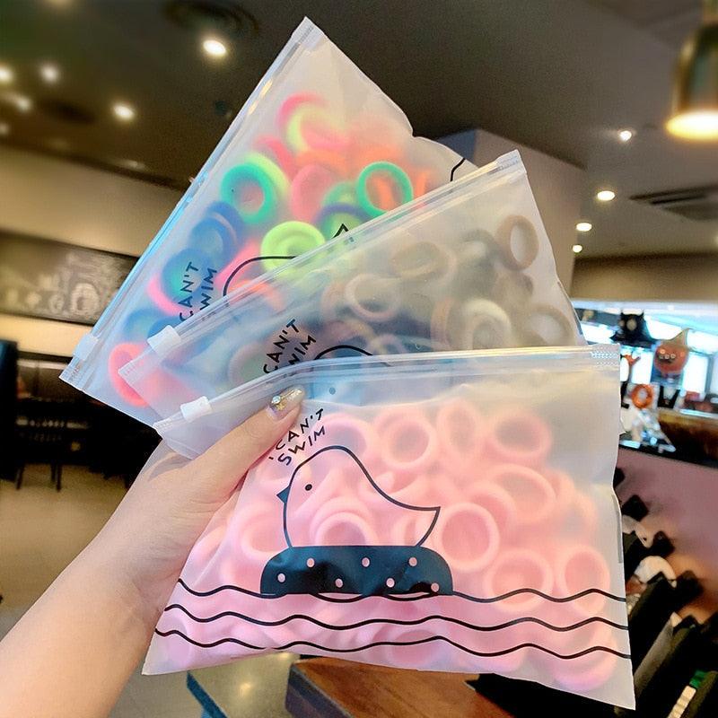 Lot de 50 chouchous à élastique de 3 cm pour filles, élastiques en caoutchouc, porte-queue de cheval, accessoires de coiffure doux et tendance pour femmes