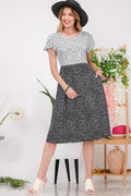 Robe d'été midi sans manches à col rond et fentes latérales pour femme – Un incontournable polyvalent, chic et intemporel avec fentes latérales et sans manches pour un style sans effort