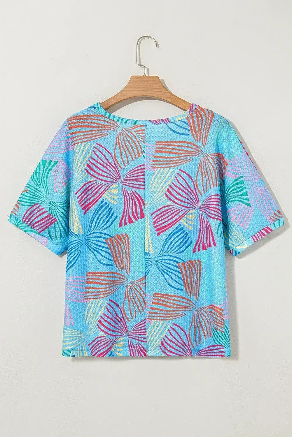 T-shirt ample gaufré bleu ciel à imprimé nœud papillon