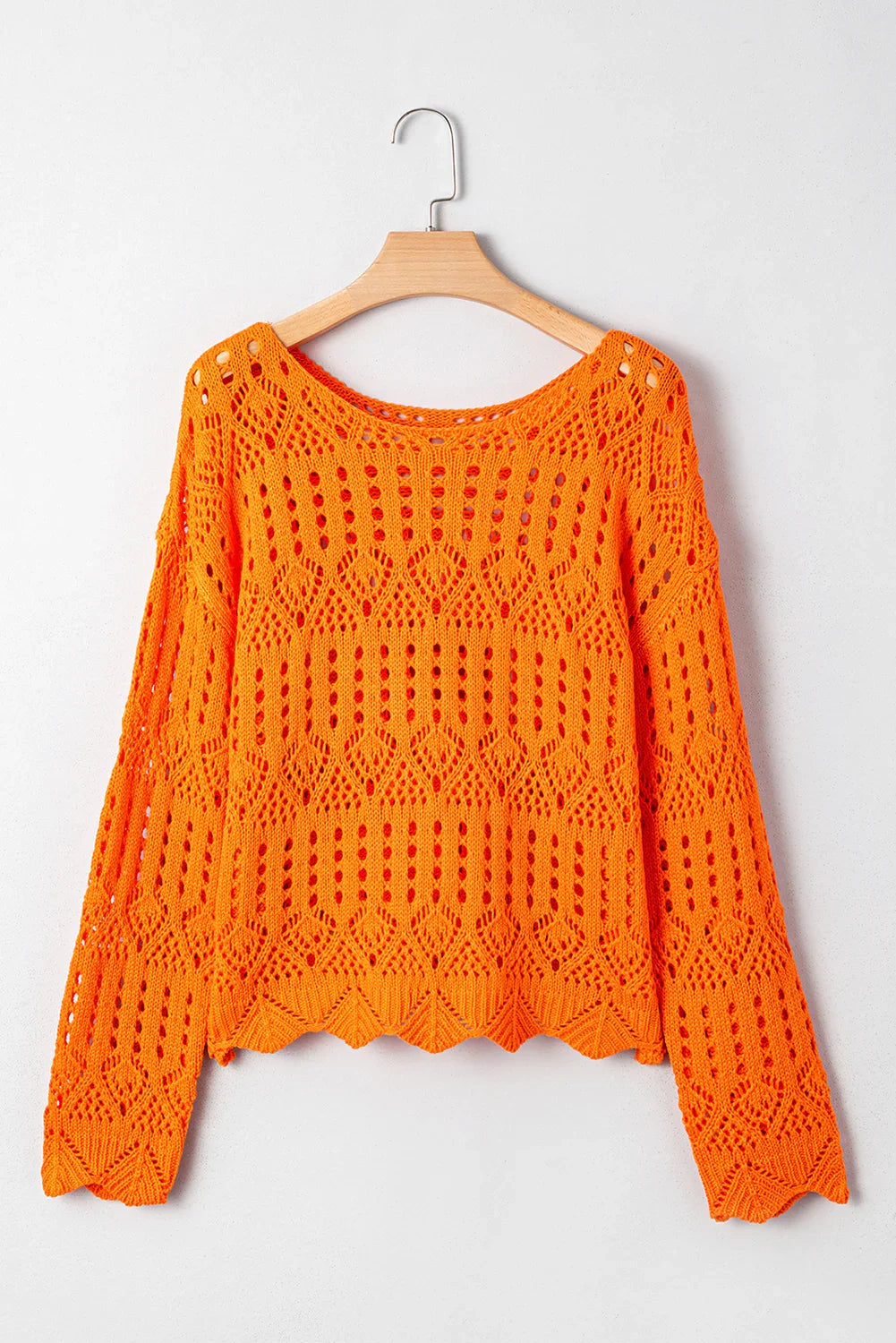 Pull au crochet uni couleur carotte avec bord festonné