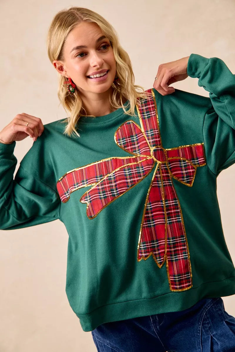 Pull en polaire de Noël BiBi avec nœud en ruban écossais