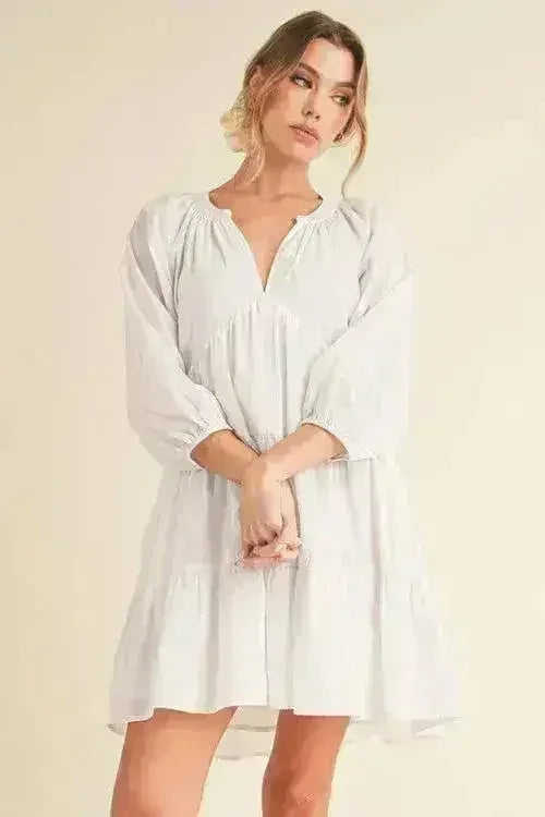 Mini-robe étagée à manches ballon entaillées Aemi + Co
