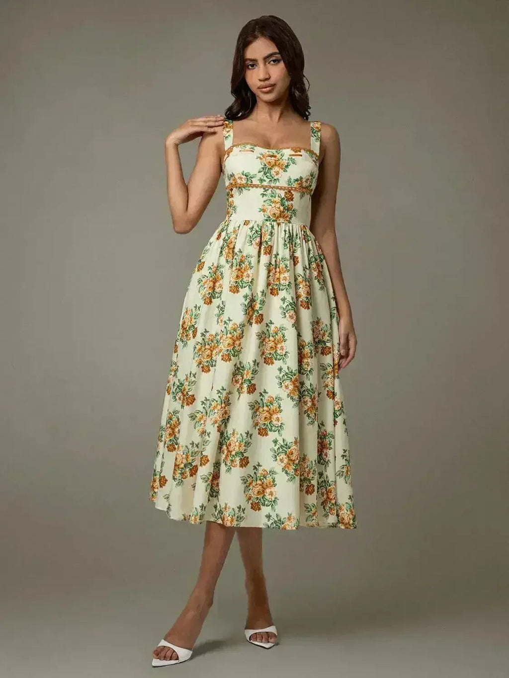 Robe midi florale sans manches bordée de dentelle