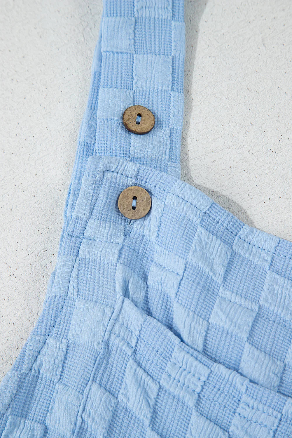 Salopette ample à carreaux beige avec poches et taille haute
