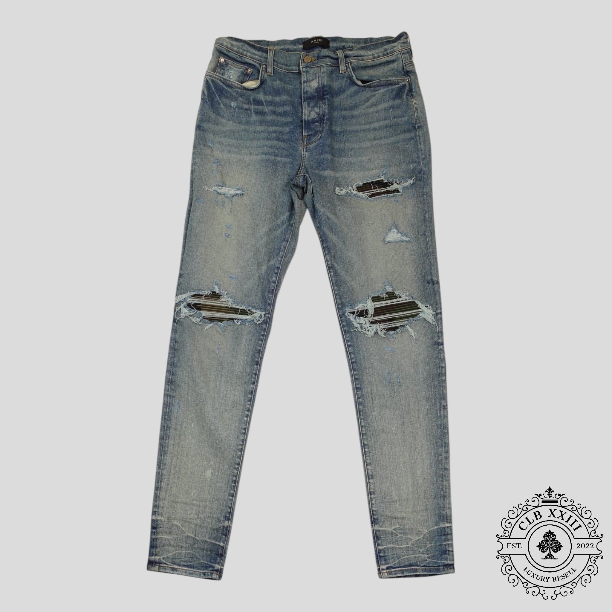 Jeans Amiri MX1 Camo Patch en indigo argileux