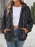 Veste matelassée zippée douillette et texturée à motif carreaux gris foncé pour femme