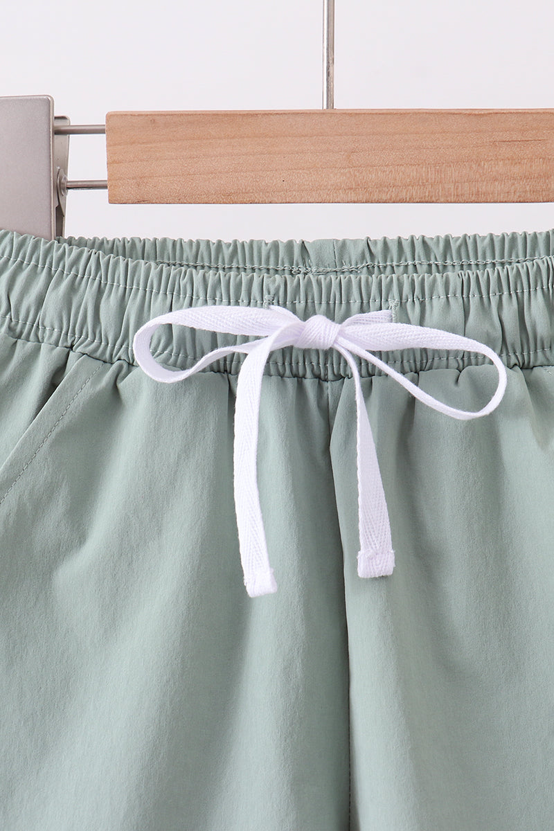 Shorts de sport de performance couleur sauge