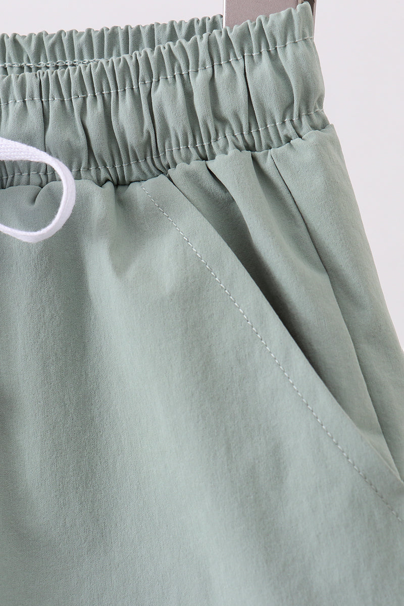 Shorts de sport de performance couleur sauge