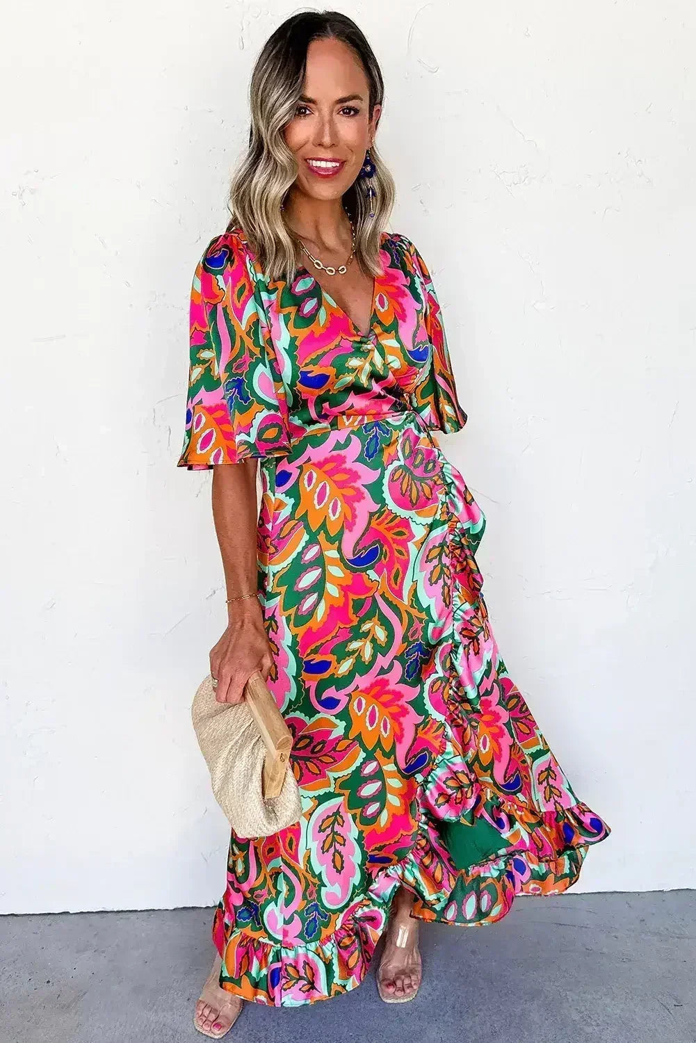 Robe longue cache-cœur à volants et imprimé plantes tropicales roses