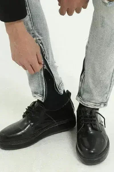 Jean usé avec poches et zip latéral