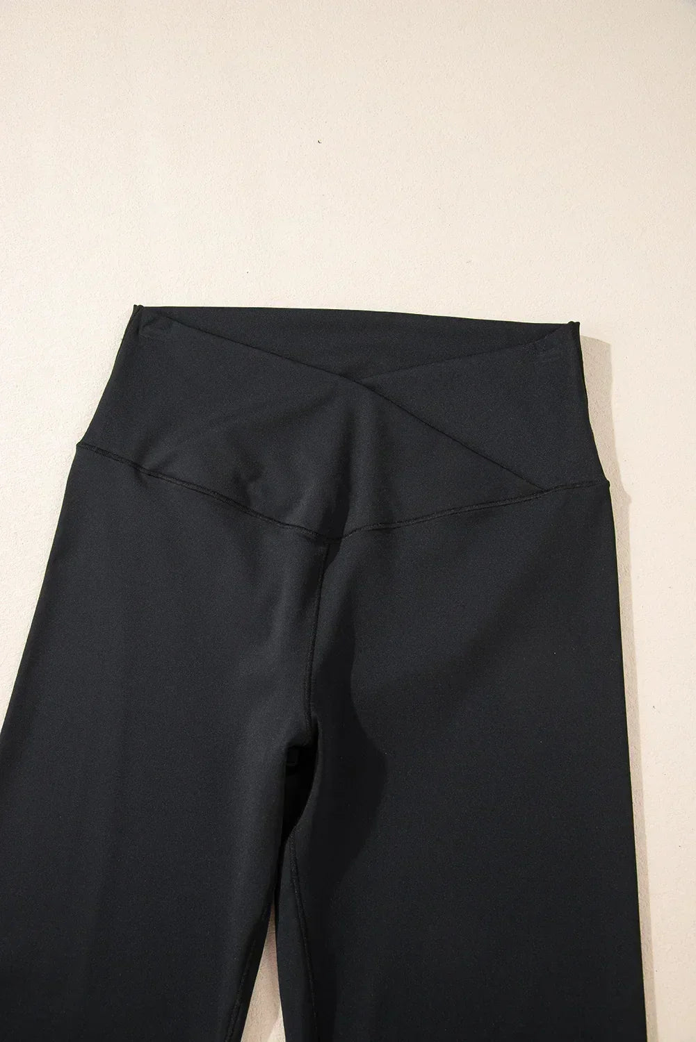 Legging évasé taille haute gris foncé avec découpe en V