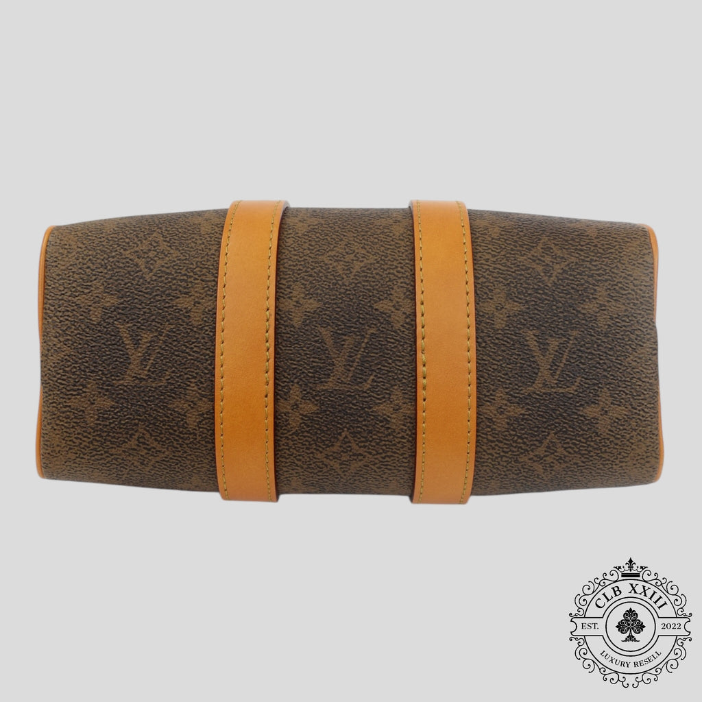 Louis Vuitton Monogramme Poussière Keepall 25