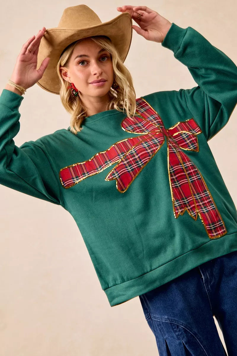 Pull en polaire de Noël BiBi avec nœud en ruban écossais