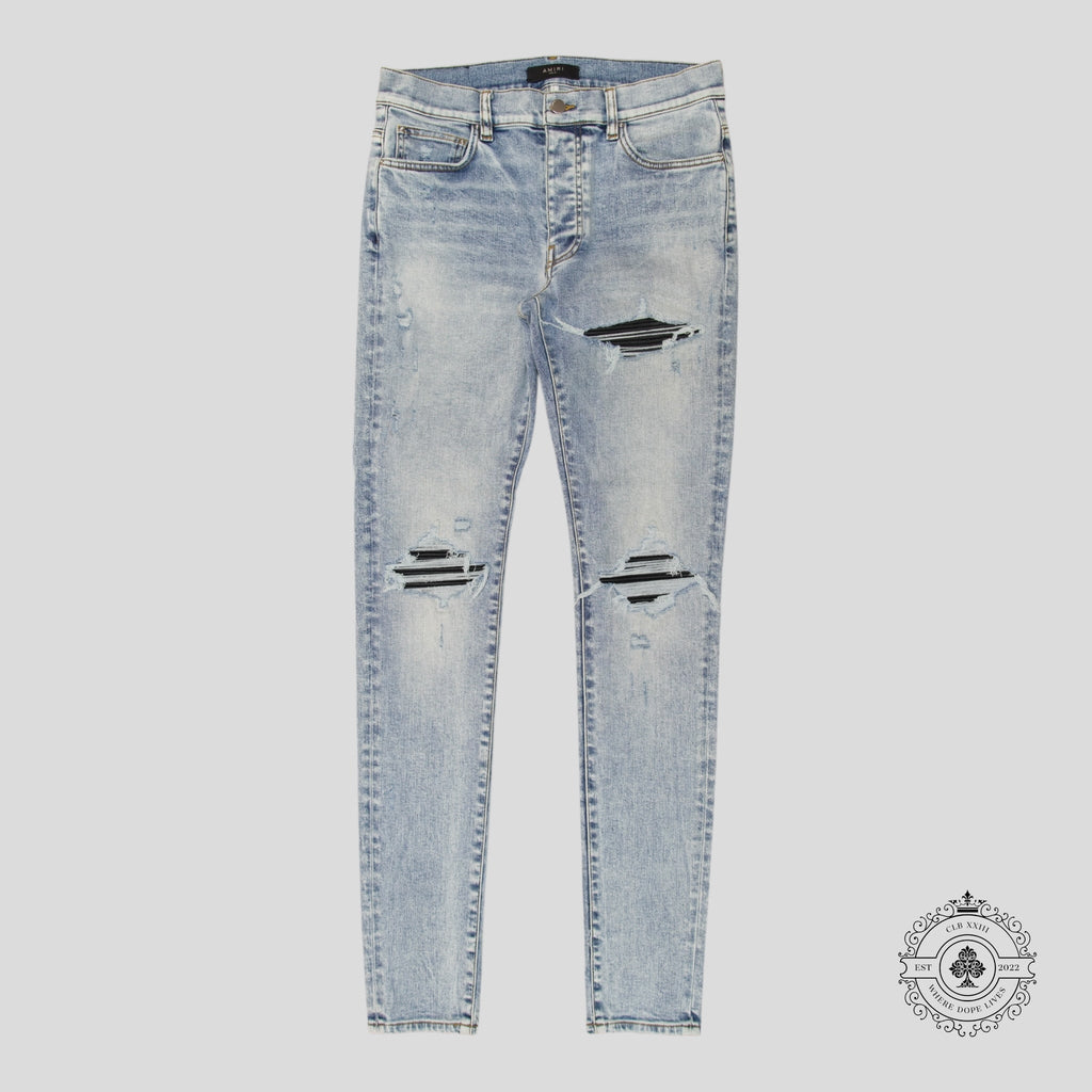 Jean Amiri MX1 en cuir et denim stone indigo