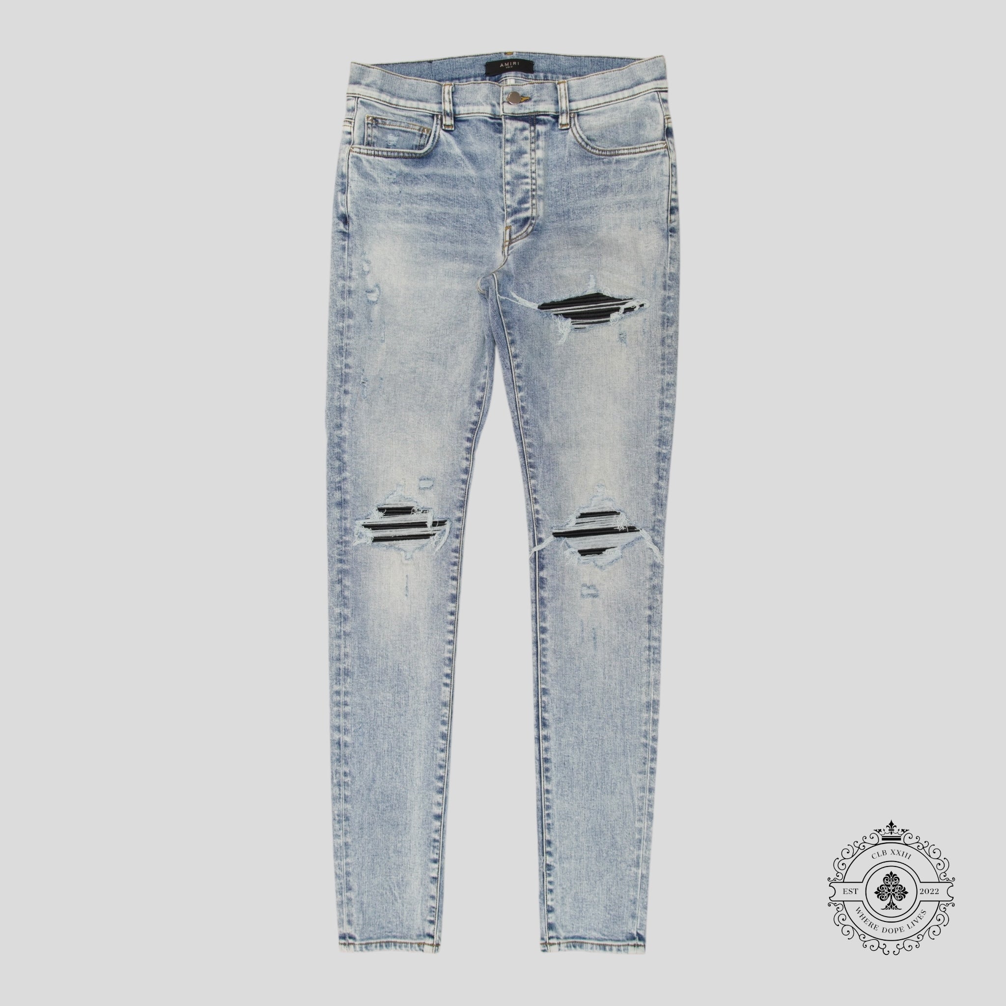 Jean Amiri MX1 en cuir et denim stone indigo