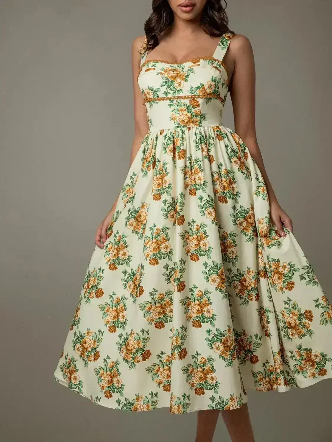 Robe midi florale sans manches bordée de dentelle