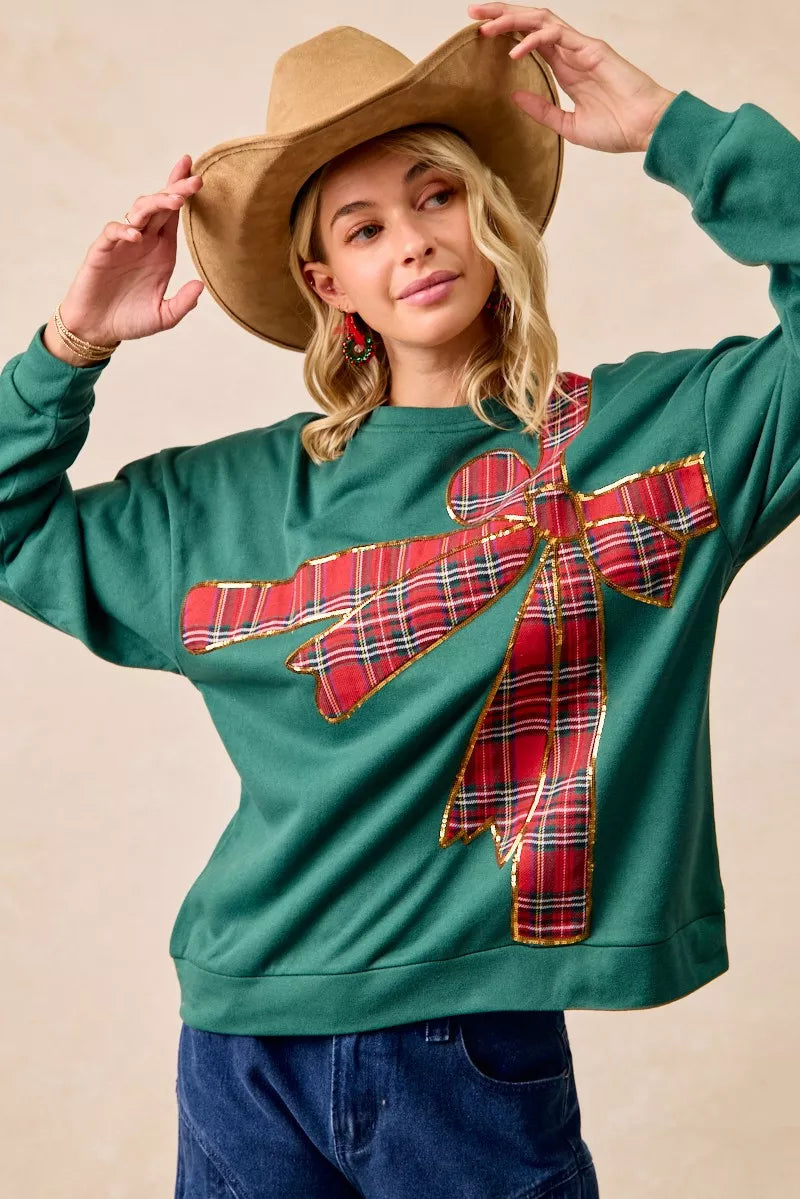 Pull en polaire de Noël BiBi avec nœud en ruban écossais