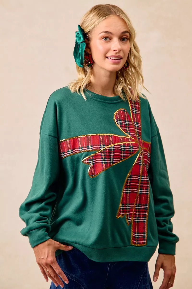 Pull en polaire de Noël BiBi avec nœud en ruban écossais