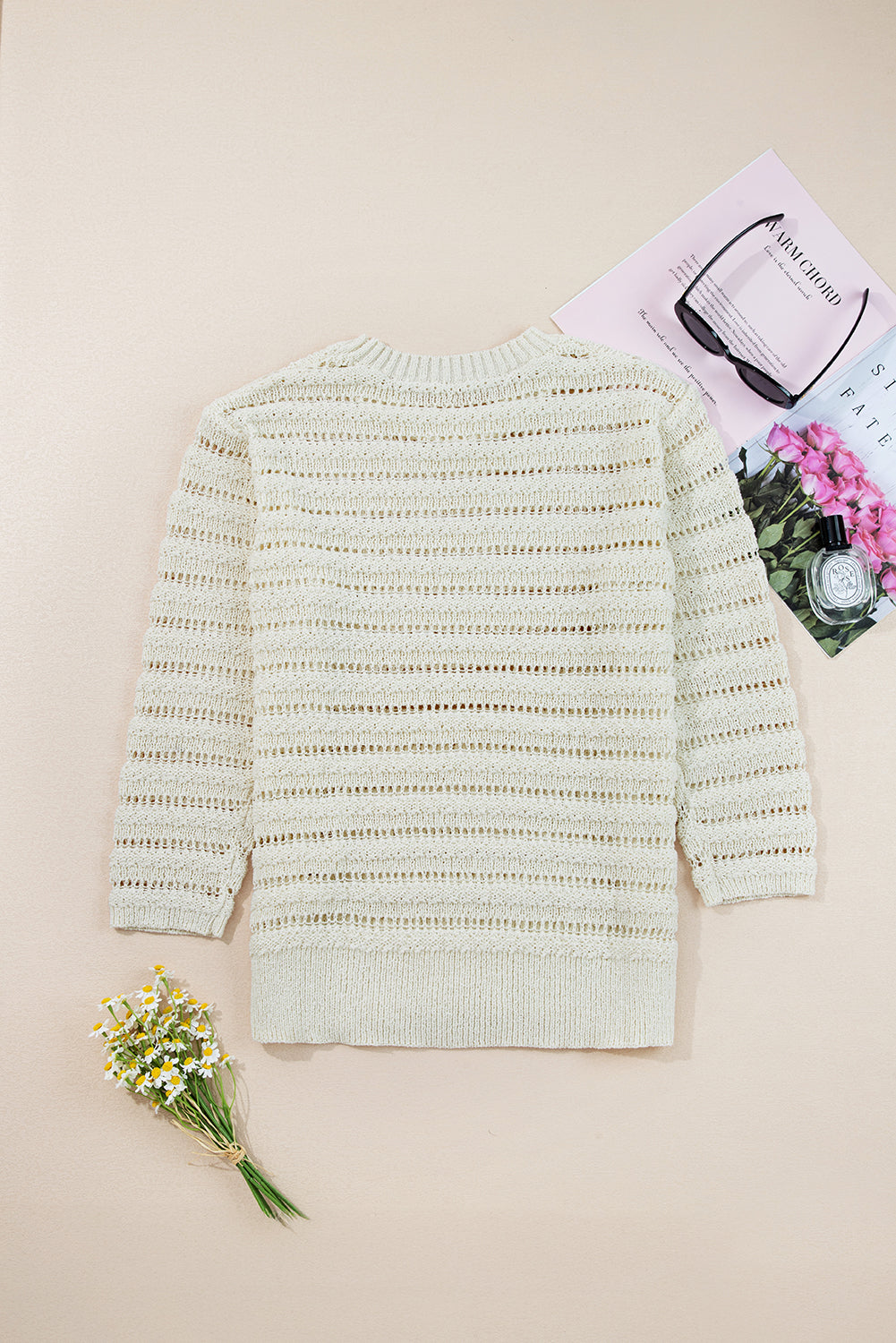 Pull en maille ajourée blanche à col rond